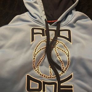 And1 long sleeve hoodie blue with fleece lining.